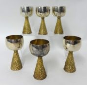 Six rough pattern silver bark finish stem goblets with polished bowls by House of Lawrian, for