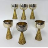 Six rough pattern silver bark finish stem goblets with polished bowls by House of Lawrian, for