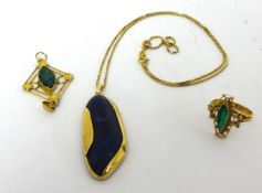 A continental gold mounted lapis lazuli Pendant, stamped 750, to an 18ct gold box link chain, a