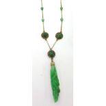 A gold and jade mounted Necklace, the carved floral drop to a trace link chain set with beads and