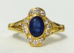 An 18ct gold sapphire and diamond ring, size K