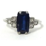 An Art Deco style sapphire and diamond ring set in unhallmarked white metal, size J