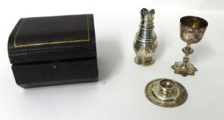 A Victorian silver three piece travelling communion set, London 1900, with floral engraved