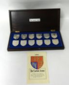 A cased set of 12 silver Royal Arms, in celebration of Queen Elizabeth II Silver Jubilee, Birmingham