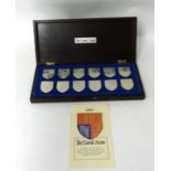 A cased set of 12 silver Royal Arms, in celebration of Queen Elizabeth II Silver Jubilee, Birmingham