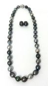 A Tahitian black baroque pearl Necklace, composed of 37 beads to a brilliant cut diamond set ball