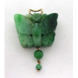 A carved jade butterfly Pendant, with unmarked gold bail, jade untested.