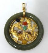 A 14kt gold and jade Pendant, the circular hoop with a gold dragon and bird centre set with vari