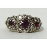 18ct yellow gold ruby and cluster ring, size G1/2.