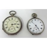 Two silver open face pocket watches, each with sub second dial.