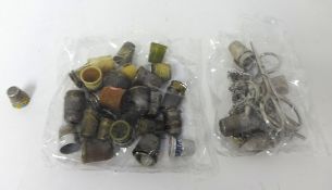 A collection of various silver and other thimbles including gilt and silver thimble