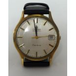 Omega, Automatic, Geneve. A 9ct gold gentlemans date Wristwatch, reference 1625422, movement