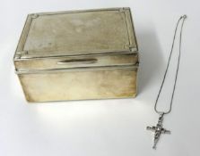 A silver jewell box, 12cm x 8cm x 6cm and a silver cross