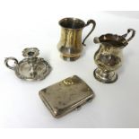 A Victorian silver small chamberstick, by J. & J. Angel, London 1841, a George III silver cream jug,