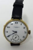 J.W.Benson. A 9ct gold gentleman's manual wind Wristwatch, Birmingham 1941, white enamel dial, to