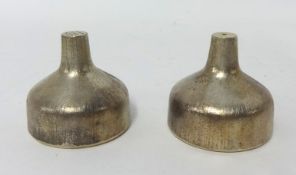 A pair of silver salt and pepper sellers by House of Lawrian, for Christopher N Lawrence, London
