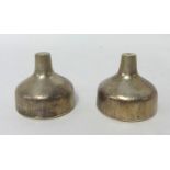 A pair of silver salt and pepper sellers by House of Lawrian, for Christopher N Lawrence, London