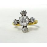 A diamond cluster Ring, claw set with an old cut stone weighing approximately 1.6cts, colour