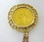 A Victoria gold sovereign, 1877, mounted in a pendant on fine chain.