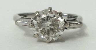 A ladies diamond solitaire ring, set in platinum, with copy of recent insurance valuation indicating