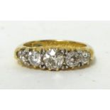 A Victorian five stone diamond Ring, claw set with graduated old cut stones, approximately 1ct