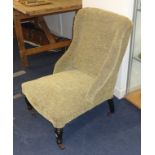 An upholstered Edwardian nursing chair.