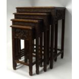 A nest of four Chinese occasional tables of square form.
