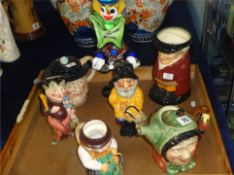 A Murano glass clown character jugs including Melba Ware Punch, Doulton 'The Huntsman', Beswick '