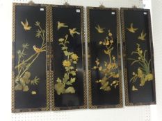 Set of four Chinese modern black lacquered panels, 86cm x 25cm