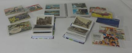 A large collection of various postcards and cigarette cards including several albums of each also