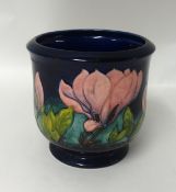 A Moorcroft jardinière, signed in green, height 23cm.