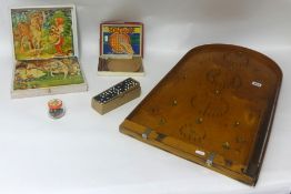 A traditional bagatelle game and other games, children's wood block puzzle etc