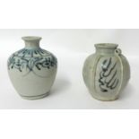 Two similar blue and white porcelain Chinese miniature jars, tallest 9cm.