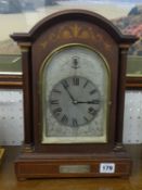 Chiming mantle clock in mahogany inlaid case with presentation plaque to P.C.Jwestacott, dated 1922,