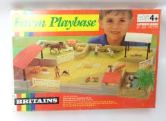 A collection of various Britain's farm boxed items and also a Lone Ranger Prairie wagon and some