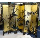 A Japanese six fold full length privacy screen decorated on one side with exotic birds on blossom