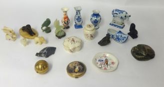 Collection of various ornaments including metal sphinx on onyx base, various trinkets, blue and