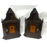 A pair of inlaid corner cabinets