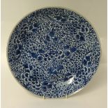 A Chinese blue and white porcelain large shallow dish, decorated with stylised flowers, diameter