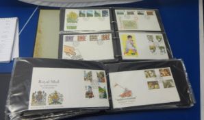 A collection of first day covers in two albums containing an interesting collection, all postal