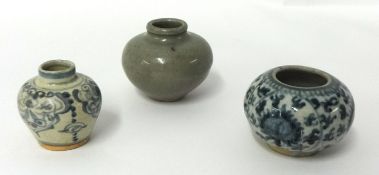 Three miniature Chinese porcelain jars, tallest 6cm.