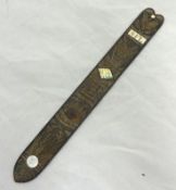 A 19th century sailors carved stay busk love token inlaid with ivory and mother of pearl, 29cm long