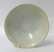 A Chinese pale porcelain bowl, with faint underglaze decoration, diameter 19cm.