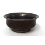 A 19th century turned wood Mazer mounted with pewter and silver, diameter 12cm.