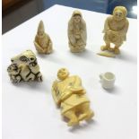 Five 20th century carved ivory netsukes (5).