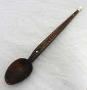 A sailors chip carved love spoon with marine ivory mounts, 39cm long, inscribed FH.