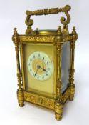 A gilt brass carriage clock with repeating mechanism, height 21cml (not running).