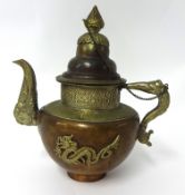 A Chinese brass and copper teapot with dragon relief decoration, height 23cm.