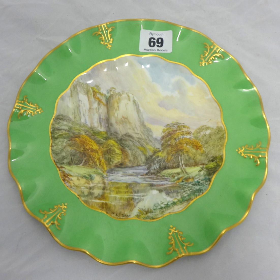 Royal Crown Derby porcelain plate, 'High Tor, Matlock', 22cm diameter.