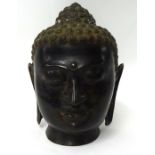 A bronze Buddha head, acquired near Borobudur, Java, Indonesia, height 32cm,